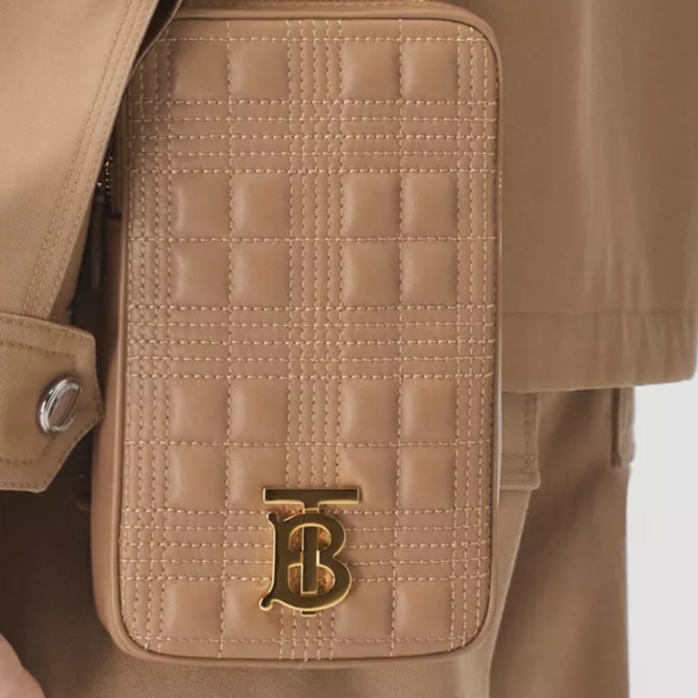 I am selling the Burberry quilted lambskin Lola pouch with chain strap.